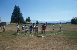Volleyball game at employee welcome-back barbecue