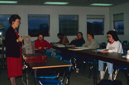 Instructor Betty Urquhart in classroom with students.