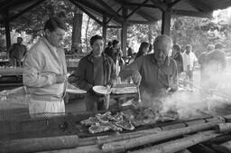 Counsellor Mark Hoffmann (centre) and unidentified others at faculty and admin retreat.